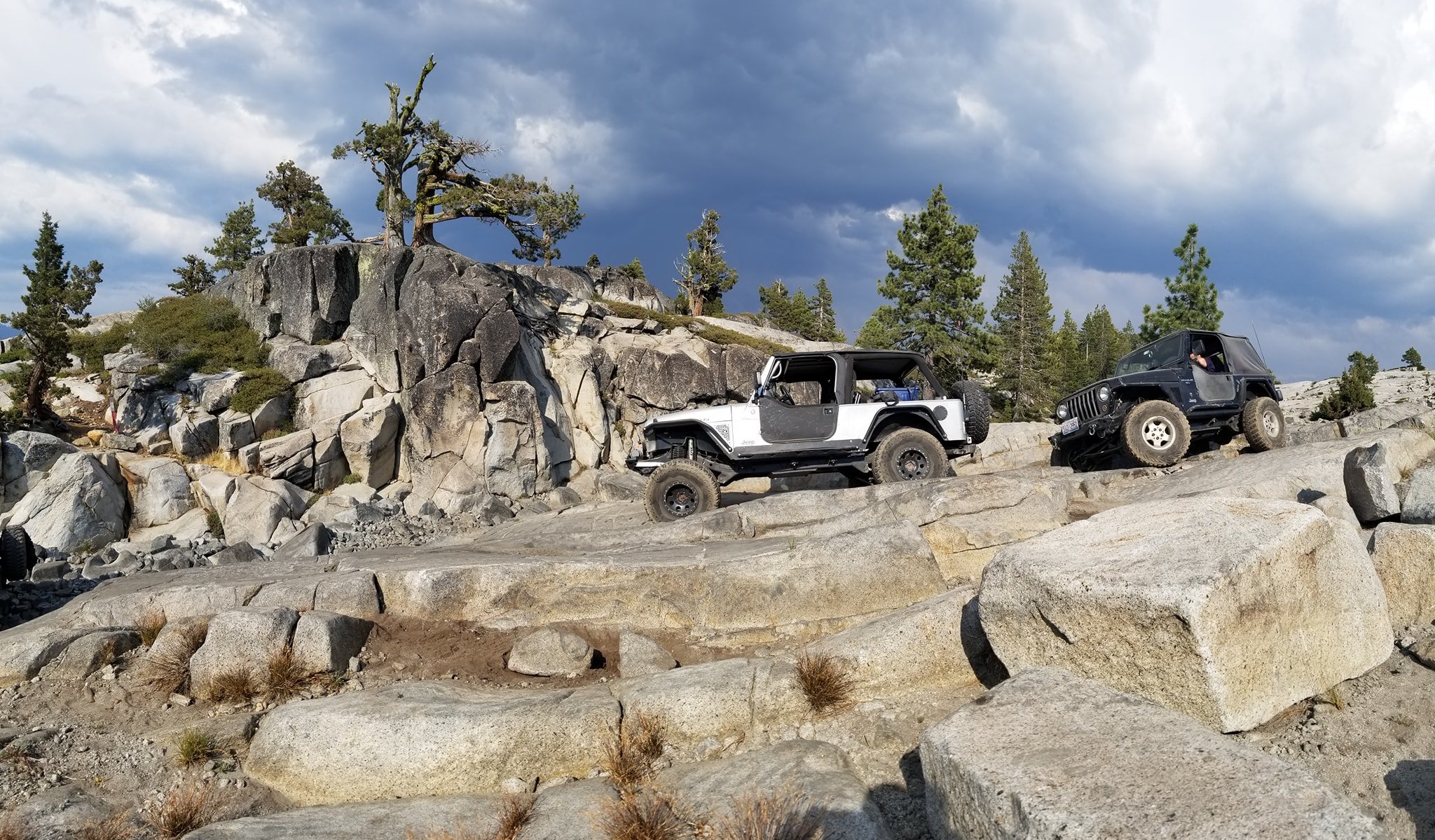 TJ and LJ navigating large rocks on the Rubicon Trail