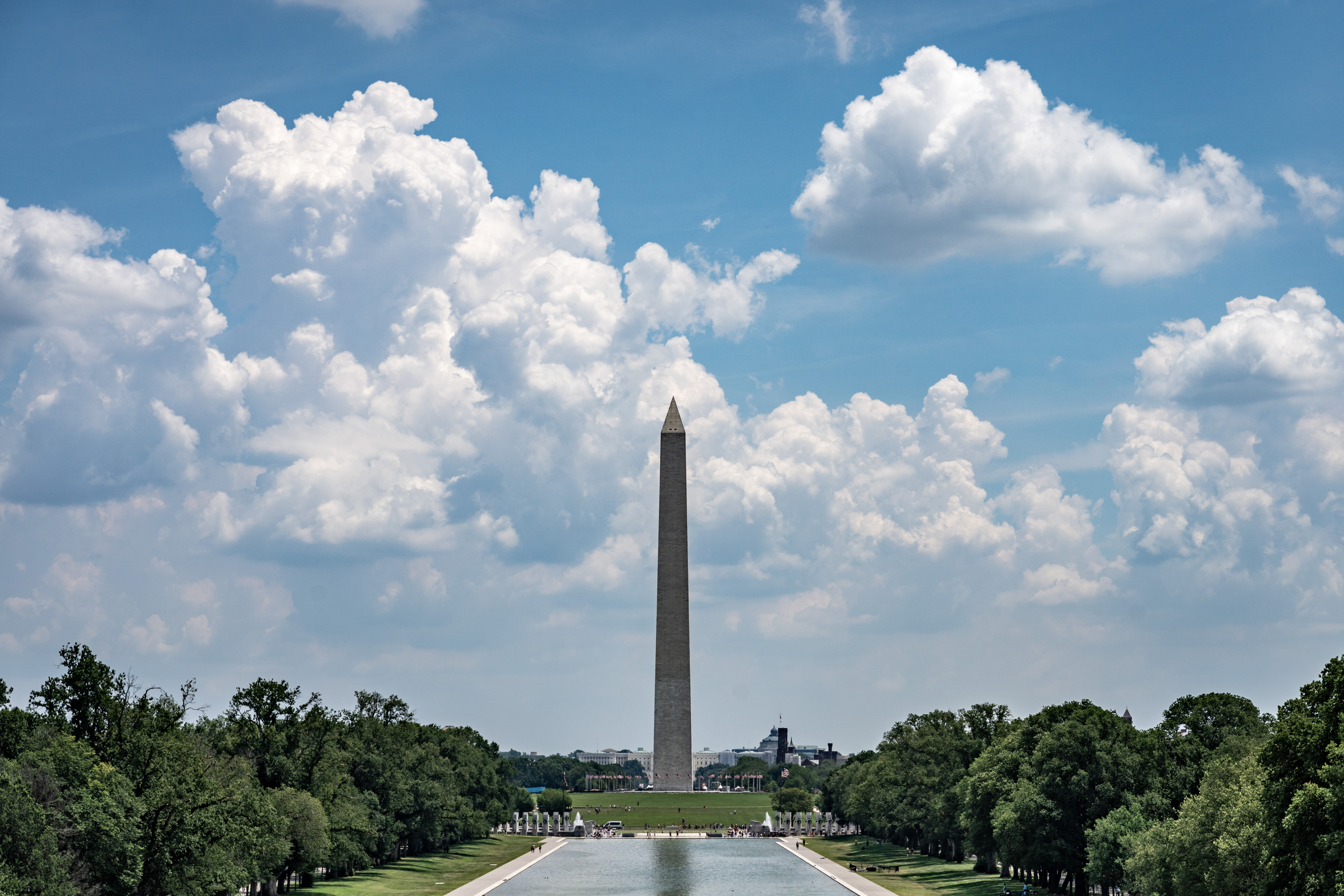 View of washington monument with clouds